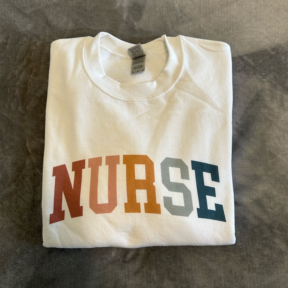Women’s nurse crewneck size M